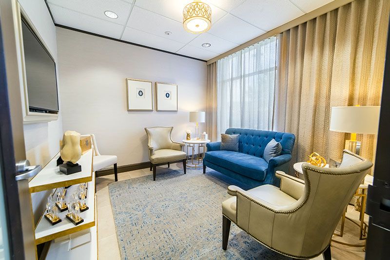 Cozy, modern waiting room with stylish furniture.
